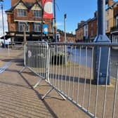 Some of the temporary fencing erected in Market Place in Melton Mowbray