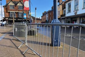Some of the temporary fencing erected in Market Place in Melton Mowbray