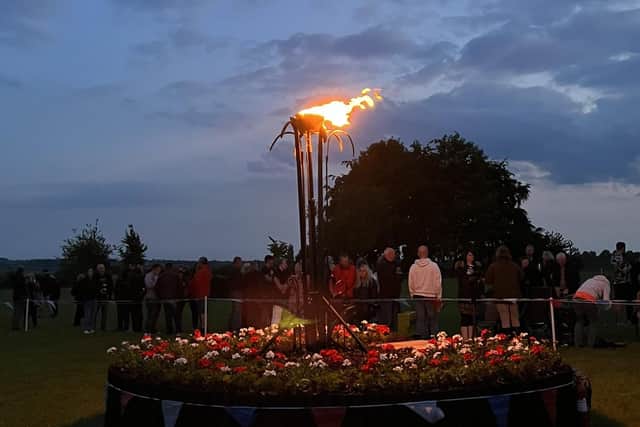 A beacon is lit at Melton's DATR centre for the Platinum Jubilee