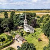An aerial photo of the grade two listed Church of St Peter, at Saxby, which has been converted into a residential property