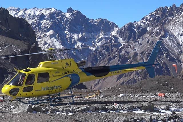 Chris Foster's helicopter arrives at Base Camp for his summit of Mount Aconcagua