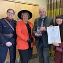 Christine Slomkowska and Patrick McCracken, of 103 The Eye, show off their King's Award at a presentation in March with Lord Lieutenant of Leicestershire Mike Kapur (right) and Deputy Lord Lieutenants Penny Coates and Dave Andrews