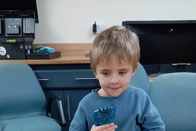 A young slot car racer at Melton Model Club
