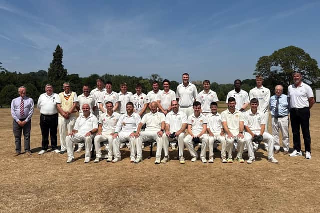 The two teams line-up before the start of the annual clash.