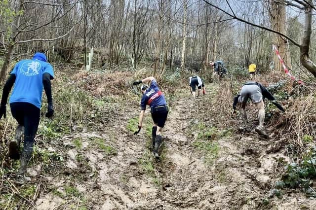 Ploughing through the mud at this year's Belvoir Challenge