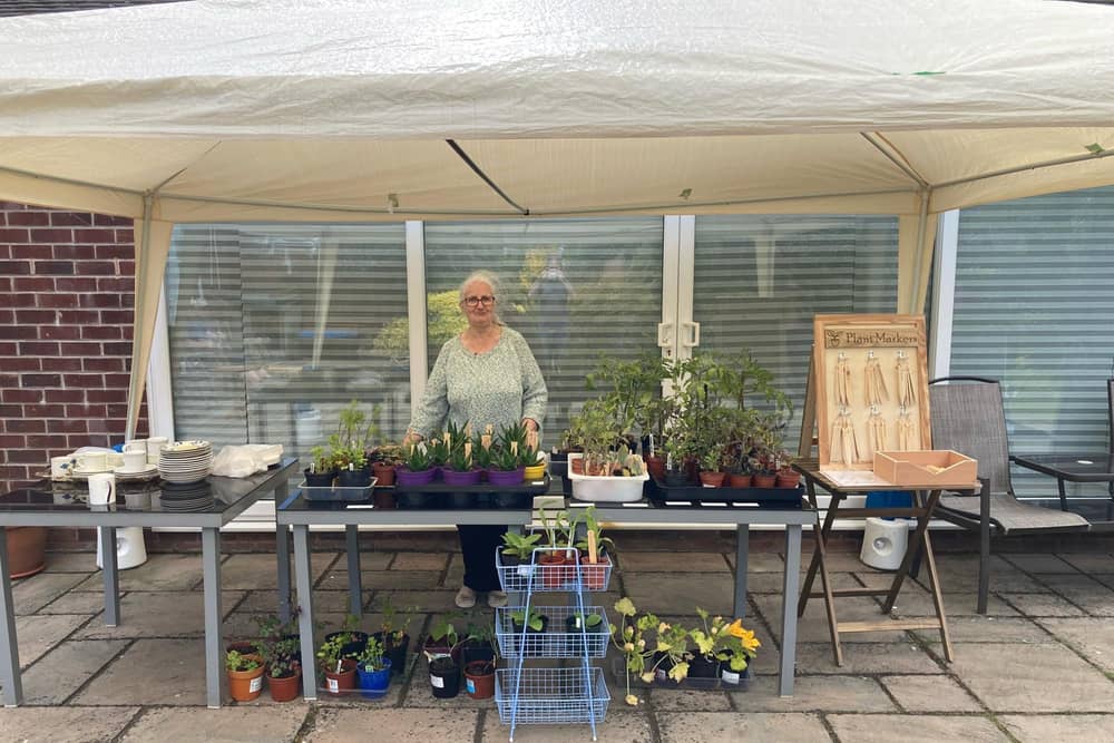 Sheila Sulley on the stall in her garden for the St John's Church fundraiser