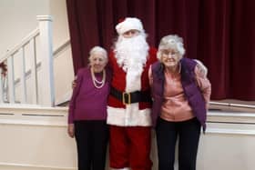 Santa drops in at a local Christmas party organised by the ReEngage charity