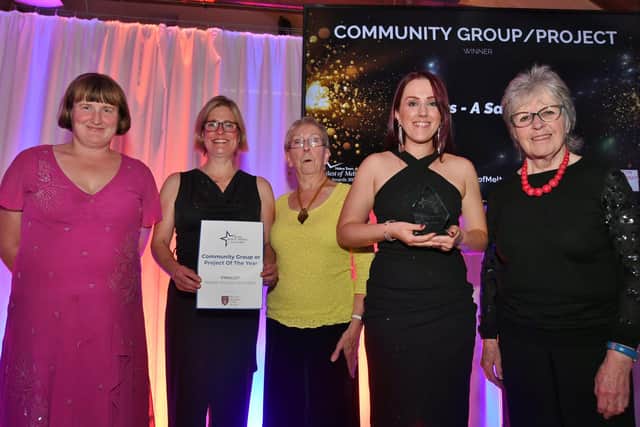 Melton Times Best of Melton Awards 2022.  
 Community Project Award sponsor Adrienne Holland with winner Peppers A Safe Place with finalists Melton Matters Wombles