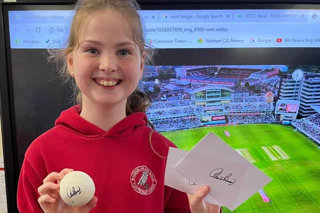 A happy Waltham pupil pictured after getting autographs from Chris Broad