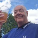 The late Alan Hemborough pictured in August 2021 toasting Leicester City's Wembley victory in the Community Shield