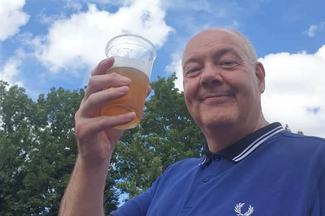The late Alan Hemborough pictured in August 2021 toasting Leicester City's Wembley victory in the Community Shield