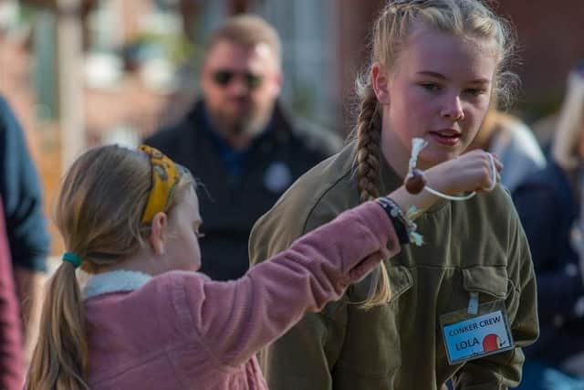 Two of the competitors in the children's conker competition at Long Clawson
PHOTO Chris Hardwick