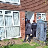 Council officials and police officers pictured closing up one of four Melton Mowbray properties this week