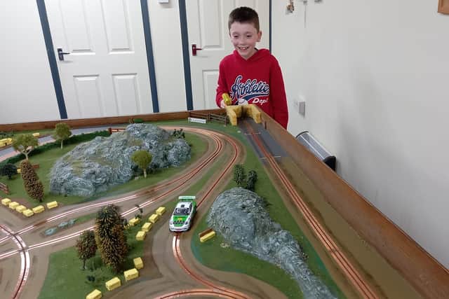 A family slot car session at Melton Model Club