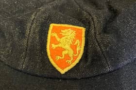 A 1951 school cap and badge for Melton's King Edward VII School