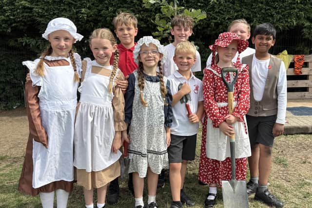 Children on the school council pictured by the tree they planted to celebrate Great Dalby Primary School's 150th birthday
