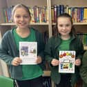 Florence Skipper (centre), the winner of the Ironstone Family of Churches Christmas card design competition, with Lila Chaumillon (left) and Chloe Moulds, who were also judged in the top three