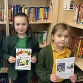 Florence Skipper (centre), the winner of the Ironstone Family of Churches Christmas card design competition, with Lila Chaumillon (left) and Chloe Moulds, who were also judged in the top three