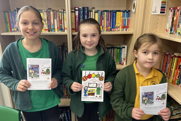 Florence Skipper (centre), the winner of the Ironstone Family of Churches Christmas card design competition, with Lila Chaumillon (left) and Chloe Moulds, who were also judged in the top three