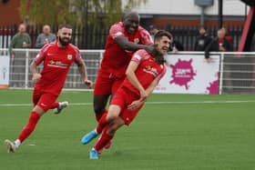 Melton's Henry Dunn is congratulated on his goal against Kimberley. Photo: Mark Woolterton.