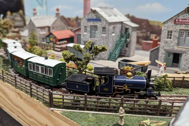 A model train chugs along at Melton Model Club