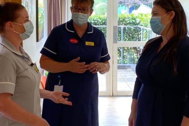 Melton MP, Alicia Kearns (right) chats to staff at Melton Mowbray Hospital during her visit