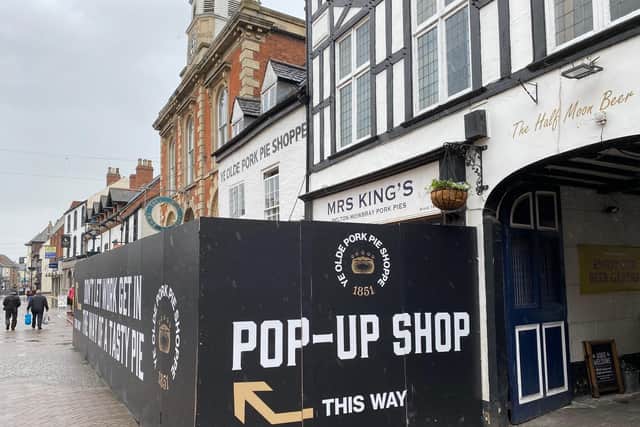 The boarded up frontage of Ye Olde Pork Pie Shoppe in Melton Mowbray as work continues to refurbish the shop interior