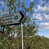 A sign directing residents to the Somerby household waste and recycling site