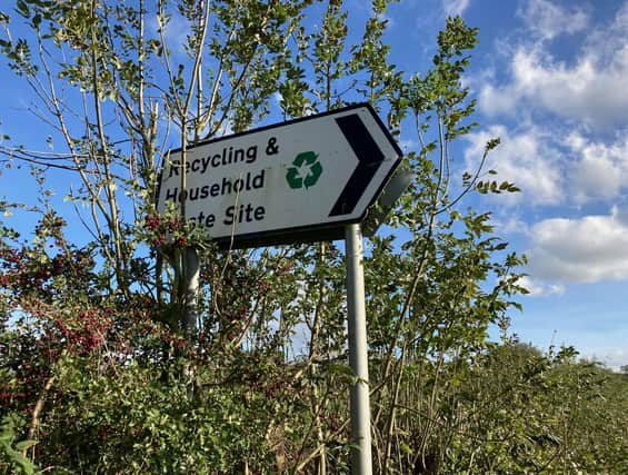 A sign directing residents to the Somerby household waste and recycling site