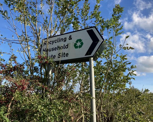 A sign directing residents to the Somerby household waste and recycling site