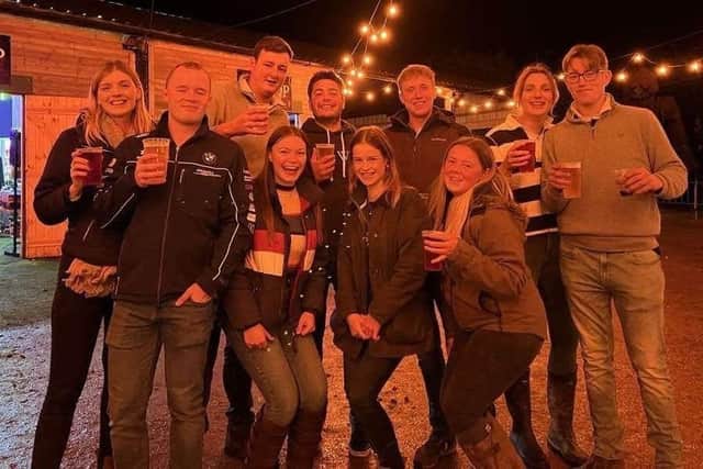 Jack Woodward, who was killed in a road incident last summer, pictured with young farmers club friends on a night out