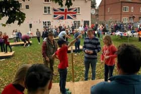 Young competitors battle it out at a  previous edition of the Vale Conker Championships at Long Clawson