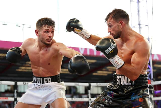 Stan Stannard, right, exchange punches with Lee Cutler in Bournemouth last May.