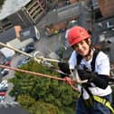 Claire Fox pictured abseiling 212ft down a building in memory of her baby daughter Luna