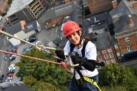 Claire Fox pictured abseiling 212ft down a building in memory of her baby daughter Luna
