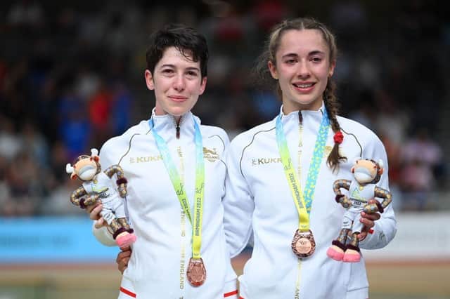 LONDON, ENGLAND - JULY 29: Tearful Sophie Unwin and Georgia Holt of Team England pose for a photo with borrowed medals after finishing third in the Women's Tandem B - Finals on day one of the Birmingham 2022 Commonwealth Games at Lee Valley Velopark Velodrome on July 29, 2022 on the London, England. (Photo by Justin Setterfield/Getty Images)