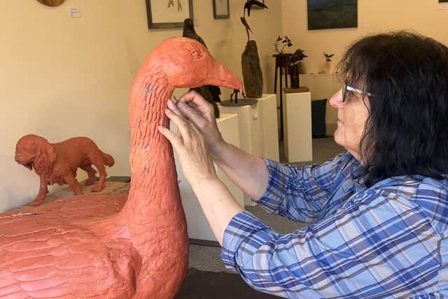 Jo Walker working on the goose in the Studio