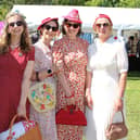 Elegant ladies dressed in 1940s fashions on Sunday