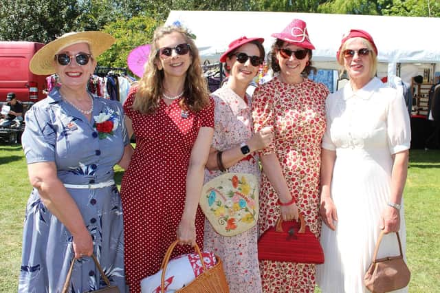 Elegant ladies dressed in 1940s fashions on Sunday