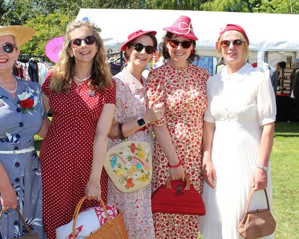 Elegant ladies dressed in 1940s fashions on Sunday