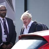 Former Prime Minister Boris Johnson arrives at Gatwick Airport in London, after travelling on a flight from the Caribbean, following the resignation of Liz Truss as Prime Minister. Picture date: Saturday October 22, 2022.