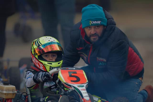 Hudson Sharpe with dad Henry on the grid