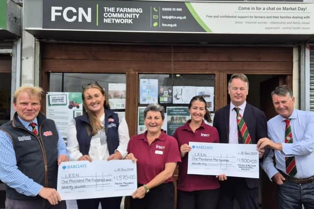 Cheques being presented at Melton market for the new ECG equipment, from left, Scott Ruck (director of auctions) & Amelia Woolford-Stannage (marketing executive), Heather Dawes (LRSN), Alice Clayton (LRSN), Sir Richard Tollemache Bt (MBAS president) and Johnathan Thompson (MBAS chairman)