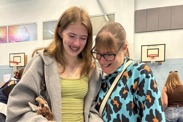 Tears of joy for Emily Porter as she checks her GCSE grades with mum Vicky at Long Field
