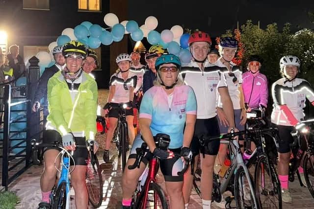 Some of the 100 cyclists who pedalled to Sheringham set off from Old Dalby in the dark early on Saturday