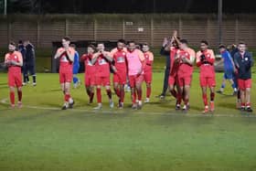 Melton players celebrate at the end of the win over Ashby. Picture by Mark Woolterton.