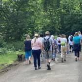 Walkers enjoying the last Dove Cottage Hospice wellbeing walk at Belvoir Castle in May