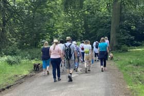 Walkers enjoying the last Dove Cottage Hospice wellbeing walk at Belvoir Castle in May