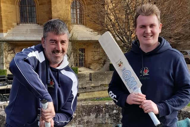 Belvoir Cricket & Countryside Trust chief executive Darren Bicknell and assistant coach Max Everett wield the charity's special cricket bats at Belvoir Castle