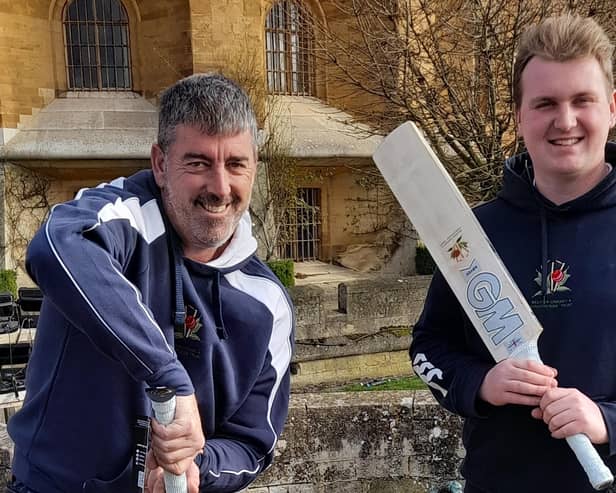 Belvoir Cricket & Countryside Trust chief executive Darren Bicknell and assistant coach Max Everett wield the charity's special cricket bats at Belvoir Castle